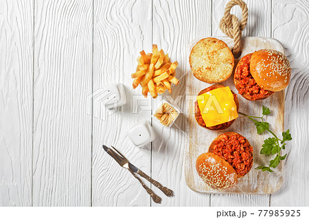 Sloppy Joe sandwiches with french Fries, top view Sloppy Joe sandwiches with french Fries, top view 77985925
