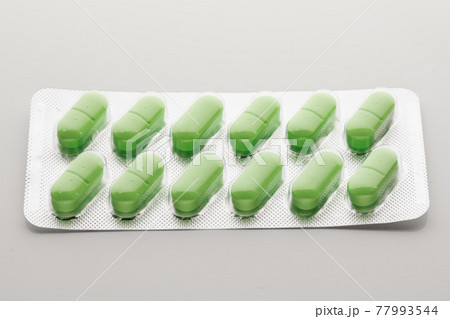 blister pack with green pills blister pack with green pills 77993544