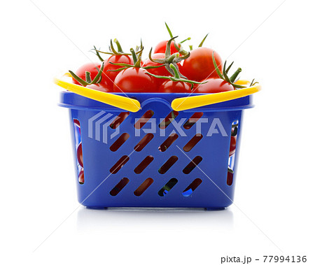 cherry tomatoes in a shopping cart, isolated on white cherry tomatoes in a shopping cart, isolated on white 77994136