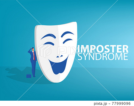 Imposter syndrome.man standing behind mask . Anxiety and lack of self confidence at work; the person fakes is someone else 77999096