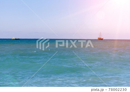 Summer landscape. Blue sea, clouds over the horizon and ships. Space for copying text 78002230