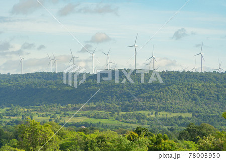 Wind turbines or windmills farm field in industry factory. Power, sustainable green clean energy, and environment concept. Nature innovation. Wind turbines or windmills farm field in industry factory. Power, sustainable green clean energy, and environment concept. Nature innovation. 78003950