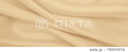 Smooth elegant golden silk or satin luxury cloth texture as wedding background. Luxurious background design. In Sepia toned. Retro style Smooth elegant golden silk or satin luxury cloth texture as wedding background. Luxurious background design. In Sepia toned. Retro style 78004056