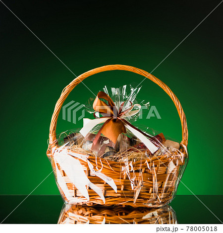 gift basket on green background gift basket on green background 78005018