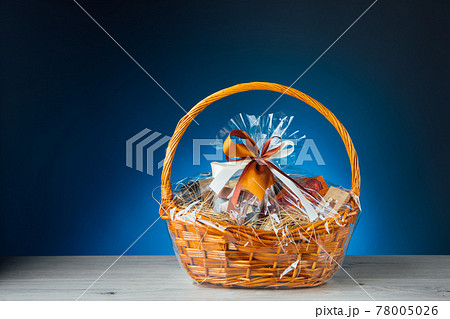 gift basket on blue background 78005026