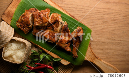 Top view of Thai-Style Grilled Chicken with sticky rice, Thai food Top view of Thai-Style Grilled Chicken with sticky rice, Thai food 78012603