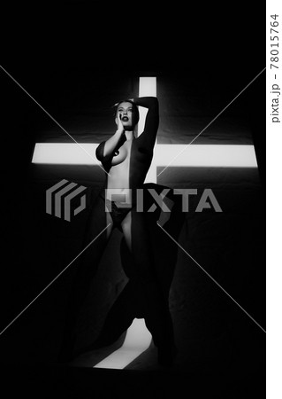 Surrealist art portrait of young lady with shadow on her body 78015764