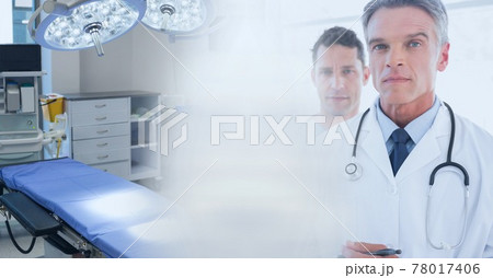 Composition of diverse group of doctors and operating theatre with motion blur Composition of diverse group of doctors and operating theatre with motion blur 78017406