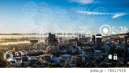 Composition of network of globes and icons over cityscape 78017428