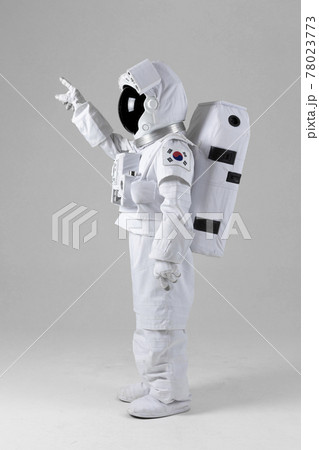 astronaut touching empty space, white background astronaut touching empty space, white background 78023773