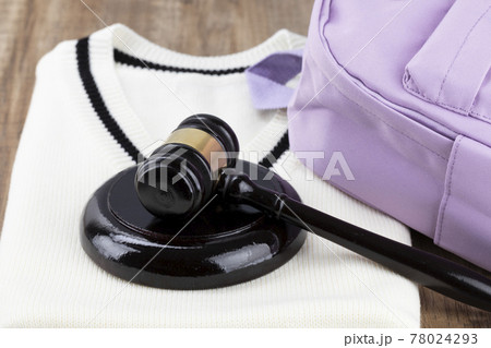 Crime and law- student criminal concept, book bag, school uniform and gavel Crime and law- student criminal concept, book bag, school uniform and gavel 78024293