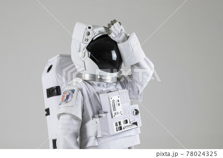 disappointed astronaut beating the forehead, white background 78024325