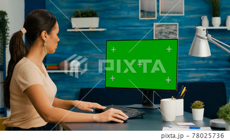 Caucasian woman working on powerful computer 78025736