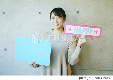 woman with message boards woman with message boards 78031985