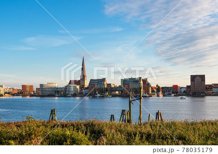 View over the river Warnow to the city Rostock, Germany View over the river Warnow to the city Rostock, Germany 78035179