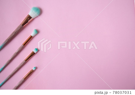 Set of make up brushes isolated on pink. Flat lay. Set of make up brushes isolated on pink. Flat lay. 78037031