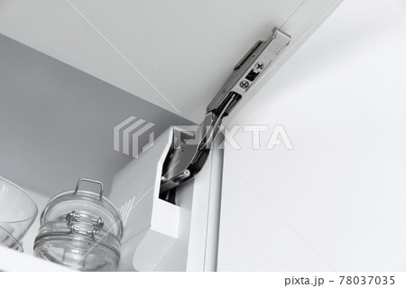 Kitchen cabinet with open fronts. Lift system for bifold fronts for direct access in kitchen cabinets.Innovative lifting mechanism for kitchen doors. Kitchen design. 78037035