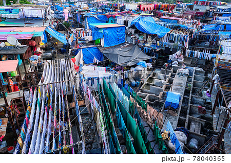 Dhobi Ghat is an open air laundromat lavoir in Mumbai, India with laundry drying on ropes Dhobi Ghat is an open air laundromat lavoir in Mumbai, India with laundry drying on ropes 78040365