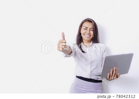 beautiful Asian business women standing in a modern collaborative office, smiling, looking at the screen of a tablet device, preparing a presentation about electronic devices. Cutting edge technology 78042312