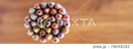 Many multicolored pencils on wooden background top view 78048282