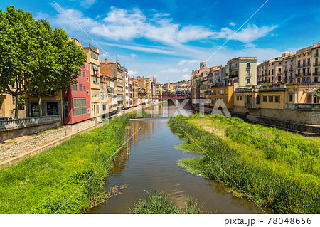 Colorful houses and Eiffel bridge in Girona Colorful houses and Eiffel bridge in Girona 78048656