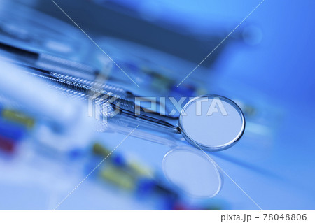 Dentist equipment on blue background Dentist equipment on blue background 78048806