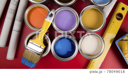 Metal tin cans with color paint and paintbrush Metal tin cans with color paint and paintbrush 78049018
