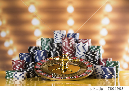 Roulette wheel running in a casino, Poker Chips Roulette wheel running in a casino, Poker Chips 78049084
