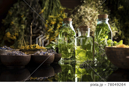 Oil, Natural remedy, healing herbs background Oil, Natural remedy, healing herbs background 78049264