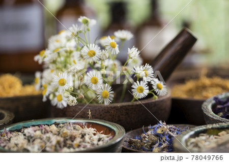 Natural remedy and wooden table background 78049766