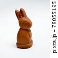 bunny shaped chocolate on white background 78055195