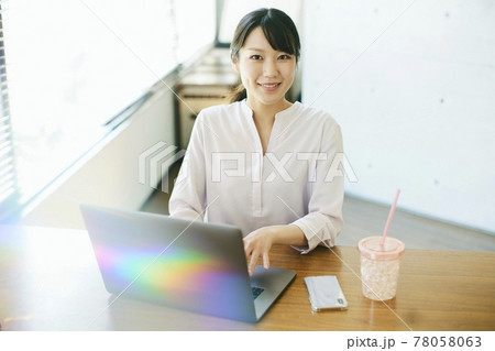 A woman working at home 78058063