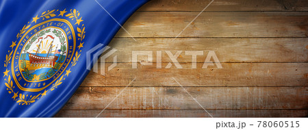 New Hampshire flag on old wood wall banner, USA New Hampshire flag on old wood wall banner, USA 78060515