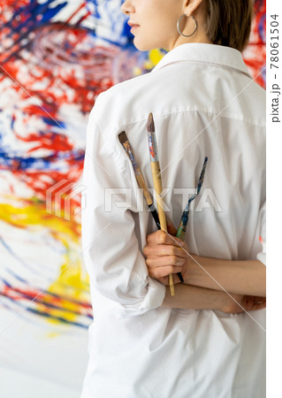 painting class modern art artist with paintbrushes 78061504
