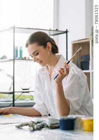 home art painting hobby inspired woman in studio 78061525