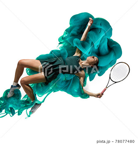 Young girl tennis player in explosion of colored neon green smoke fluid isolated on white background. Levitation 78077480