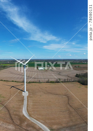Aerial vertical of a wind turbine on a beautiful day 78080131