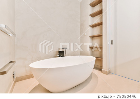 Soaking tub in luxury bathroom Soaking tub in luxury bathroom 78080446