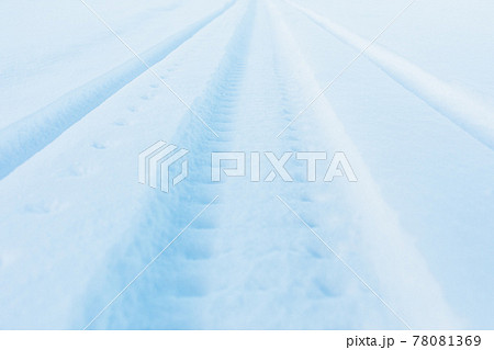snow track imprint of snowmobile, close-up view snow track imprint of snowmobile, close-up view 78081369