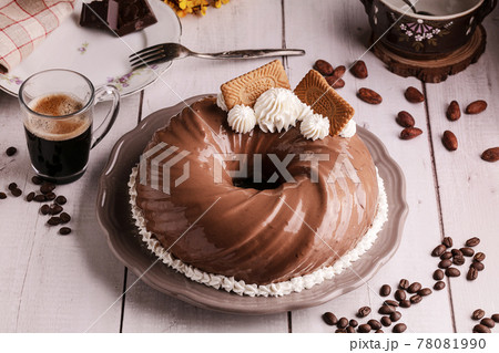 Chocolate and coffee cake with a cup of coffee Chocolate and coffee cake with a cup of coffee 78081990