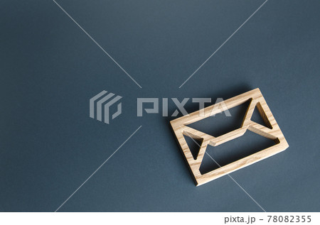 Wooden letter envelope. Contact concept. Postal correspondence. Mail notification. Communication internet technologies. Email. Business representations on the Internet and social media. Feedback 78082355