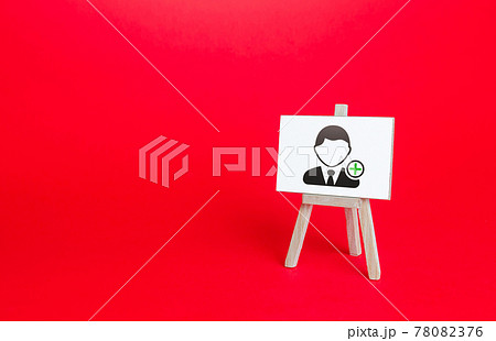 Easel with a symbol of hiring new employees. Help wanted. Recruiting and HR management. Hiring workers, staffing. Search for skilled specialists and professionals. Headhunters and Human Resources. Easel with a symbol of hiring new employees. Help wanted. Recruiting and HR management. Hiring workers, staffing. Search for skilled specialists and professionals. Headhunters and Human Resources. 78082376