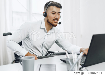 Disabled young man businessman working from home Disabled young man businessman working from home 78082481