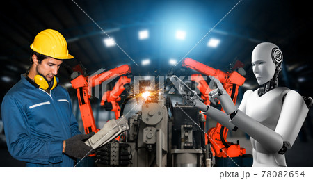 Mechanized industry robot and human worker working together in future factory Mechanized industry robot and human worker working together in future factory 78082654