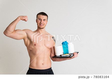 Fitness protein jars white on white background bodybuilder powder strong high ache painful, person isolated massage medicine, muscular holding. Tension red problem suffer attractive 78083164
