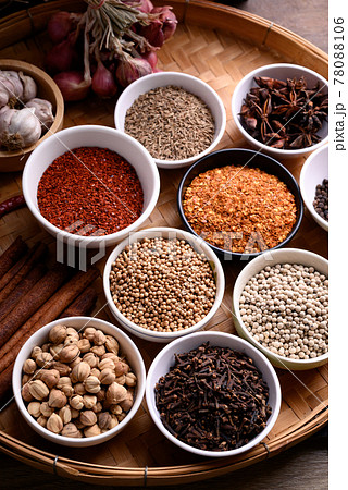 Various dry spices and herbs in a bowl on bamboo tray. Asian food ingredients  78088106