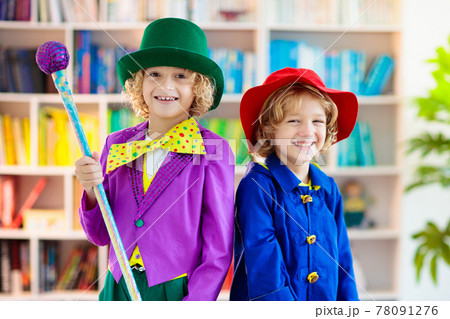 Kids in book character costume. School party. 78091276