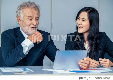 Senior executive manager and young businesswoman. Senior executive manager and young businesswoman. 78091898