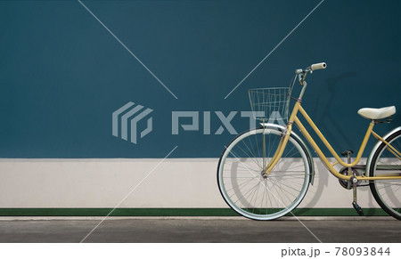 Maid Bicycle or City Bike Parking against the Wall. Car Free Day. Eco Friendly Vehicle. Environmental Care and Reduce Carbon Concept. Outdoor scene. Daylight Maid Bicycle or City Bike Parking against the Wall. Car Free Day. Eco Friendly Vehicle. Environmental Care and Reduce Carbon Concept. Outdoor scene. Daylight 78093844