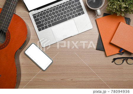 Mock up computer laptop, smart phone and classical guitar on wooden floor. Mock up computer laptop, smart phone and classical guitar on wooden floor. 78094936